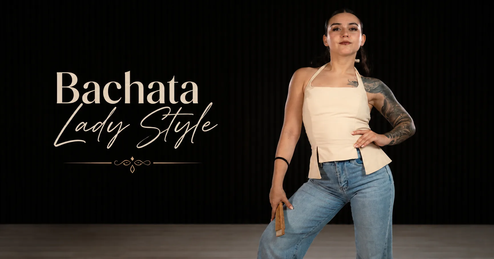 Lucía in a bachata ladies styling pose next to the Bachata Lady Style lettering